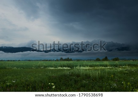                     mountain valley before the rain           