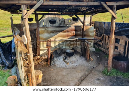 an old wooden hut at the sheepfold, in romania Royalty-Free Stock Photo #1790606177