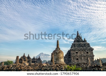 Plaosan Temple with dramatic sky in the morning with the dark and grainy temple stone, it looks noise. Is famous temple one of the Buddhist temples located in Prambanan district - Indonesia. 