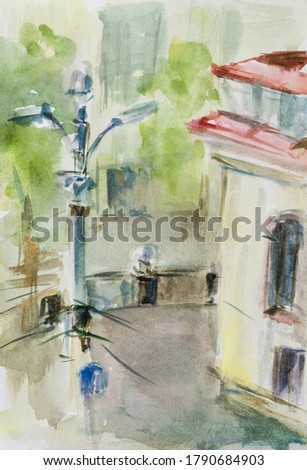 Watercolor sketch of an urban landscape. Quick sketch in the vertical format of a city street. Lamppost and corner of the building. City sketch.