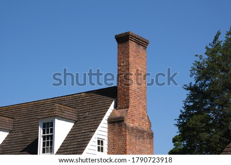 
A chimney is an architectural ventilation structure made of masonry, clay or metal that isolates hot toxic exhaust gases or smoke produced by a boiler, stove, furnace, incinerator or fireplace. Royalty-Free Stock Photo #1790723918