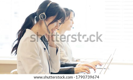 Group of asian operator. Call center. Customer support. Royalty-Free Stock Photo #1790739674