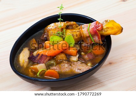 Image of cock-a-leekie soup with chiken, leek and bacon, traditional Scottish dish Royalty-Free Stock Photo #1790772269