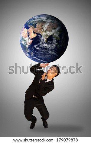 businessman carry the earth (NASA). Extremely detailed image including elements furnished by NASA