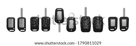 Set of electronic car key front and back view and alarm system. Realistic car keys black color isolated on white background. 3d realistic mockup. Vector illustration, eps 10. 