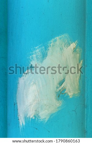 Abstract background of brush strokes on city wall for creative backdrop. Beautiful street art graffiti. Vandal, hooligans have stained the wall. Abstract creative drawing of trendy colors on city wall