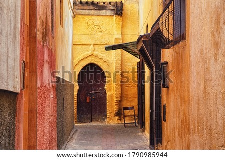 Narrow streets of in Meknes medina. Meknes is one of the four Imperial cities of Morocco and the sixth largest city by population in the kingdom. Royalty-Free Stock Photo #1790985944