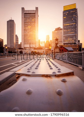 The architecture of Boston in Massachusetts, USA showcasing the Boston Harbor and Financial District with its mix of contemporary and historic buildings.