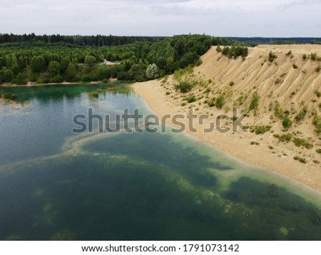 Old flooded sand pit aerial photo. Bornitskie Quarries, Russia