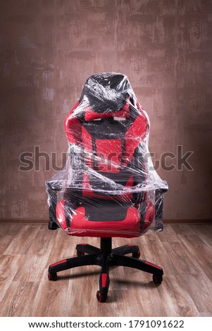 gaming chair furniture delivery. moving service concept. equipment for gamer.