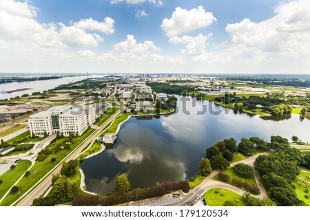 aerial of baton Rouge with Mississippi river and oil refineries at the horizon Royalty-Free Stock Photo #179120534