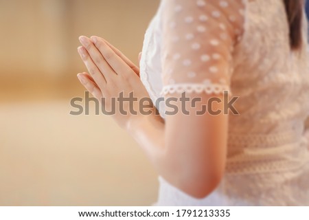 Asian Woman Praying Hands With Faith In Buddhism. Woman Hands Pay Respect. Royalty-Free Stock Photo #1791213335