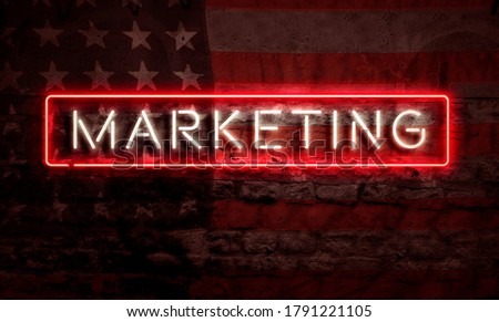 Marketing Word Neon Sign On Brick Wall American Flag USA