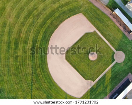 Baseball diamond in pristine condition during the day  Royalty-Free Stock Photo #1791231902