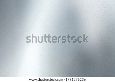 Glowing silver foil glitter paper wall with copy space, abstract texture background