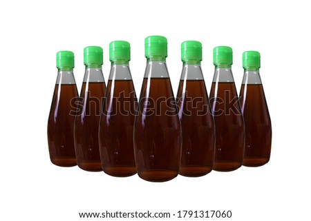 Fish sauce in glass bottle isolated on white background by Thailand. 2020 Year