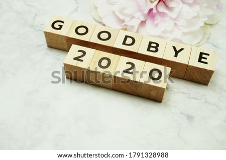 Goodbye 2020 alphabet letters on marble background Royalty-Free Stock Photo #1791328988