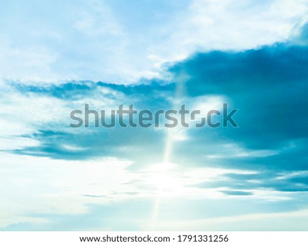 Beautiful blue sky and white clouds of various shapes with sunlight. Nature background Royalty-Free Stock Photo #1791331256