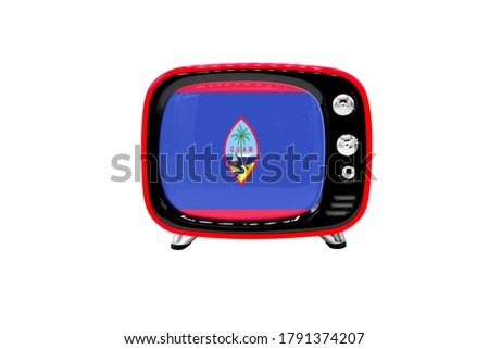The retro old TV is isolated against a white background with the flag of Guam