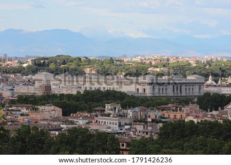 Aerial picturesque view of Rome, View from the top in cloudy day.Photography on the highest point of the Janiculum hill on the square Piazza Garibaldi.Rome cityscape 