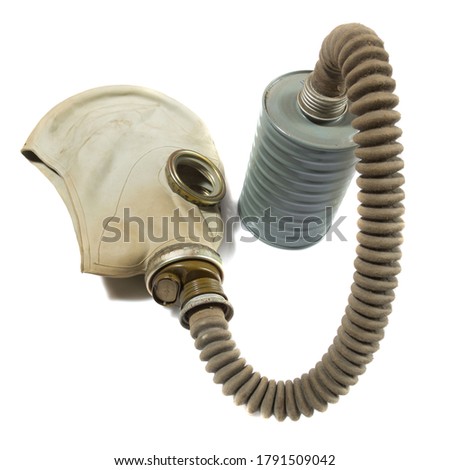 Old vintage gas mask on a white background.