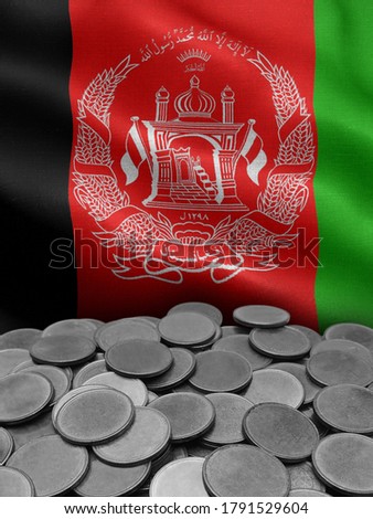 coins isolated on afghanistan flag background.
