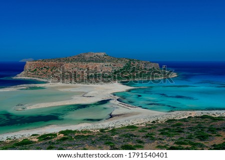 The famous lagoon of Balos is located approximately 56km northwest of Chania and 17km northwest of Kissamos, formed between the Cape Gramvousa and the small Cape Tigani and below the range of Platiski Royalty-Free Stock Photo #1791540401