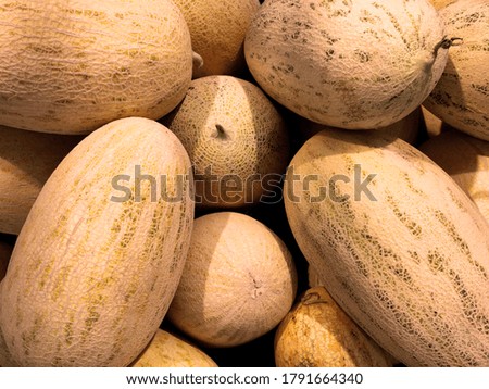 ripe melons on the counter of a health food store. High quality photo