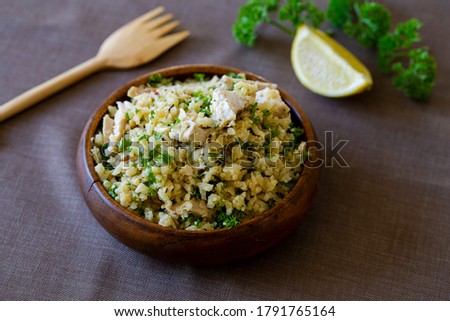 Greek Style Chicken with Cauliflower Rice, lemon and Parsely Royalty-Free Stock Photo #1791765164