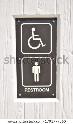 Men's Restroom Sign on the Outside of Park Facilities