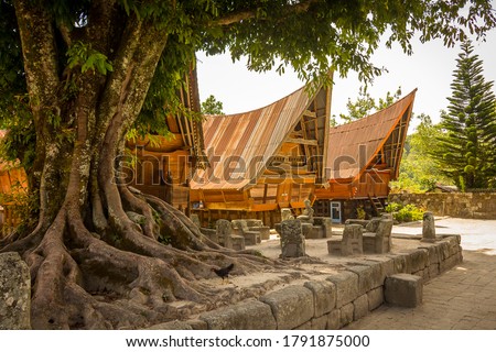 Traditional Bataknese houses at Samosir, Lake Toba, Sumatra Indonesia Royalty-Free Stock Photo #1791875000