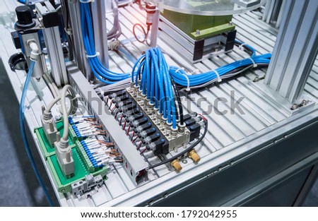 automatic pneumatic piston unit on industrial machine,automation compressed air factory production Royalty-Free Stock Photo #1792042955