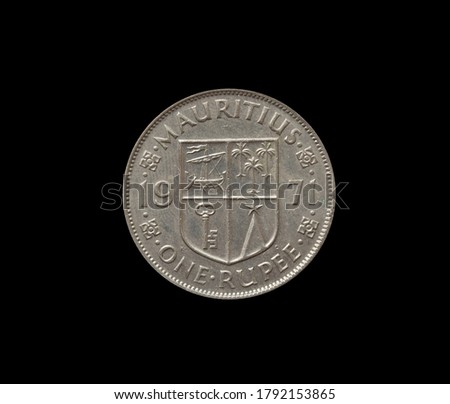 One rupee coin made by Mauritius in 1971, that shows Numeral value and coat of arms
