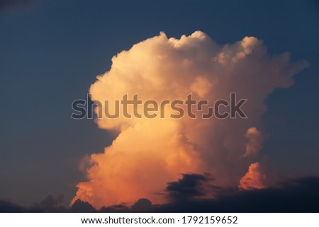 Clouds on the background of pure nea at sunset concept