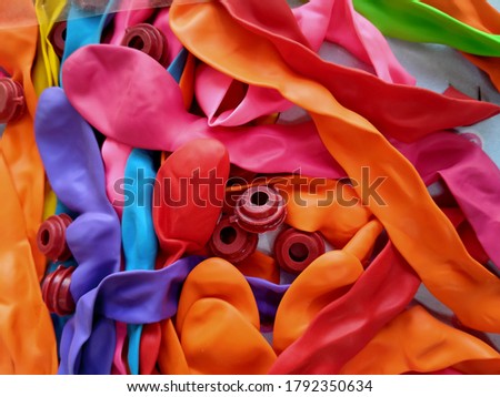 Close up capture of beautiful balloons isolated on wooden background.With selective focus on subject.

