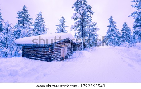 Winter cabins in the woods in lapland, Finland