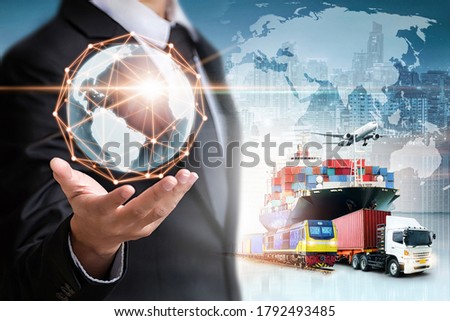 Businessman holding digital globe in palm for logistics import export background and container cargo freight ship transport concept