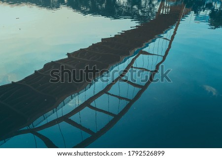 shadow bridge on the river or sea water