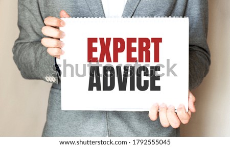 Businessman holding a card with text Expert Advice