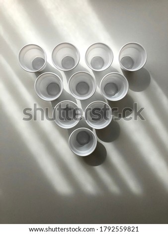 Non-recycle plastic cups with white background and shadows