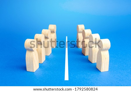 The two opposing sides are separated by a white line. Resolution of the conflict through negotiations. Mediation and Arbitration. Deescalation of dispute. Concluding a truce, end of confrontation Royalty-Free Stock Photo #1792580824