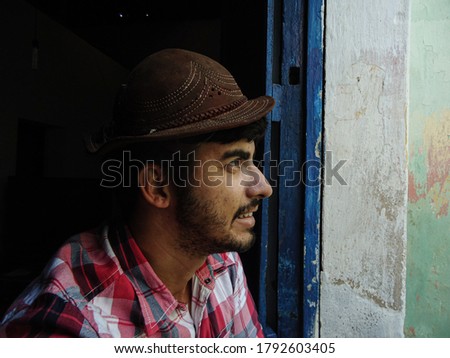 Young bearded man with typical clothes from the Brazilian northeast. Royalty-Free Stock Photo #1792603405