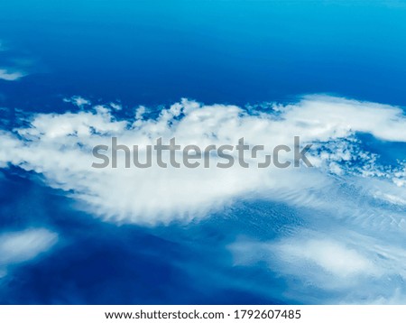 Senene sky with white cloud on its background, atmosphere, natural background. Copy space. Place to insert title text