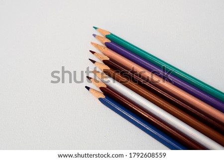 Close up color school pencils isolated on white background.