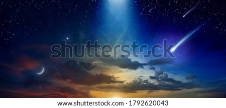 Amazing heavenly image with beautiful glowing sunset, comet and shooting stars, rising crescent moon and bright stars. Elements of this image furnished by NASA