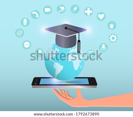 Global Education technology concept. Hand holding digital smart phone with virtual globe and graduation cap,  graphical user interface icons on education contents around in light blue background.