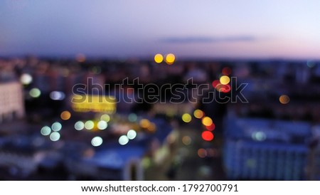 Defocused photo of the city in the evening