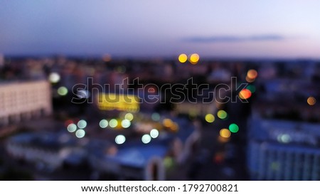 Defocused photo of the city in the evening
