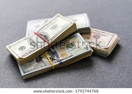 a pack of lies the US currency on background of dollars