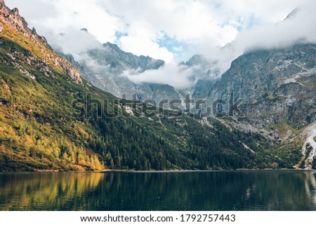 landscape view of autumn lake in mountains